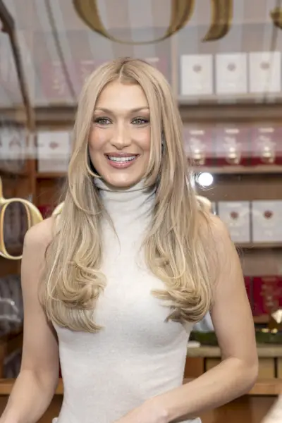 An image of the bardot fringe hair trend on Bella Hadid.