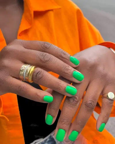 Neon green nails.