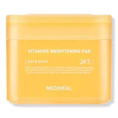 Beauty editor Kaitlyn McLintock posing while wearing toner pads