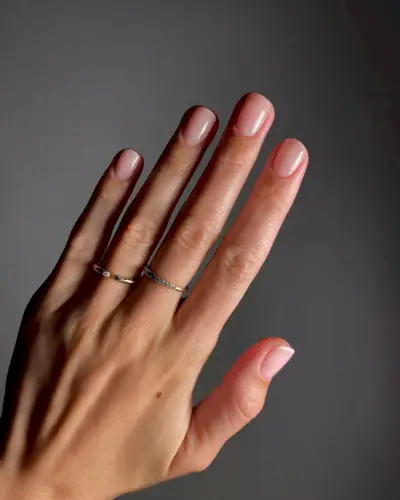A barely-there french tip manicure by Mate Janova