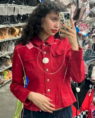 curly shag haircut with micro bangs