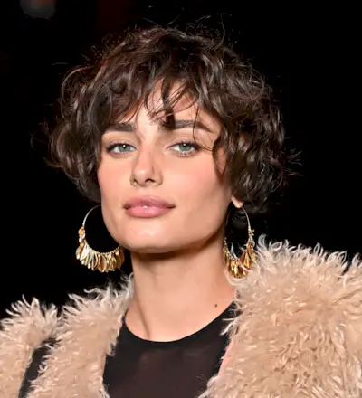 Taylor Hill wearing a bixie haircut by Marty Harper.