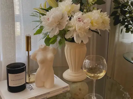 Coffee table aesthetic with a Byredo candle