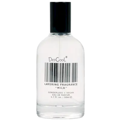 Photo of many perfumes on a vanity shelf