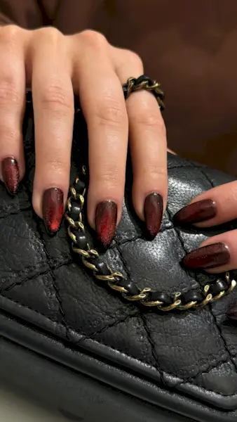 dark red cat eye nails