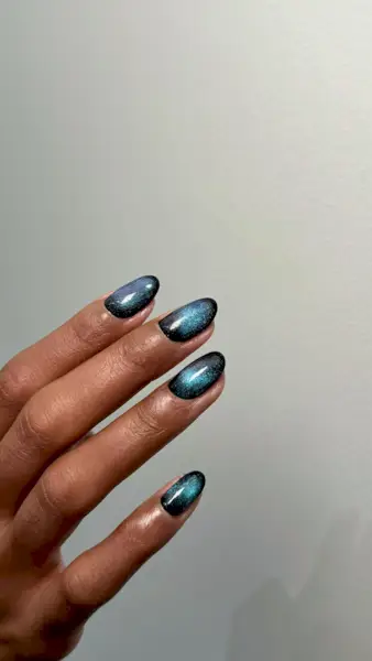 Black and blue cat eye nails