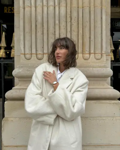 a woman with a bob hairstyle and textured fringe