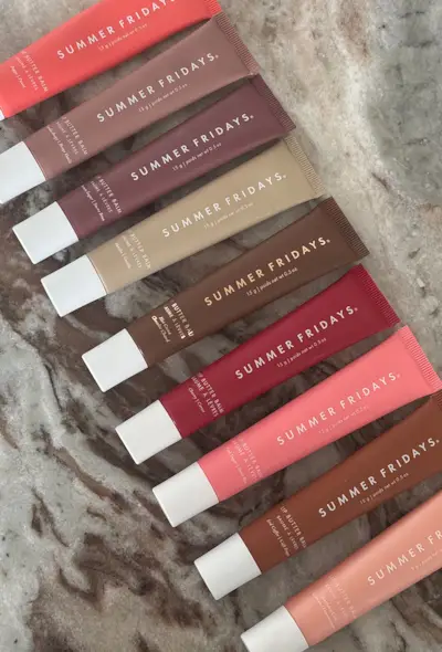 Summer Friday Lip Butter Balm flavours on marble surface