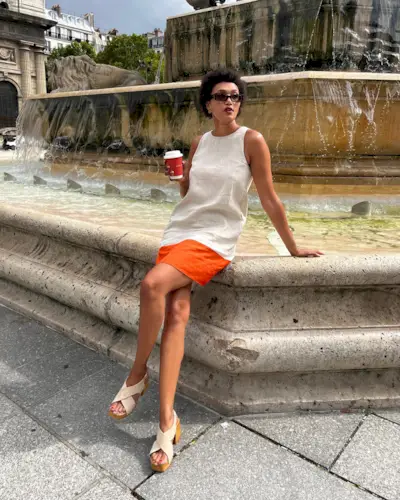 @lenafarl with naturally curly hair