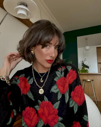 @juliesfi with a wavy bob and fringe