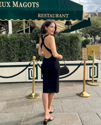 @melodiebance with a voluminous, curly bob