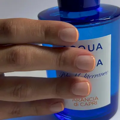 Short nails with orange French tip