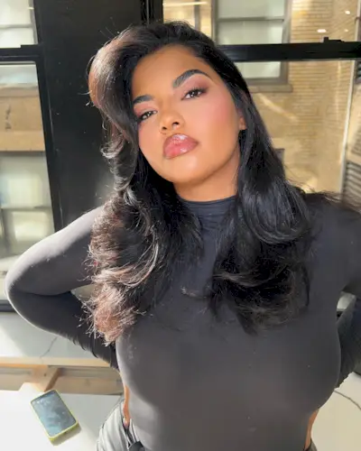 Model Ingrid Medeiros wears a bronzed makeup like with winged eyeliner by makeup artist Judi Gabbay Braha.