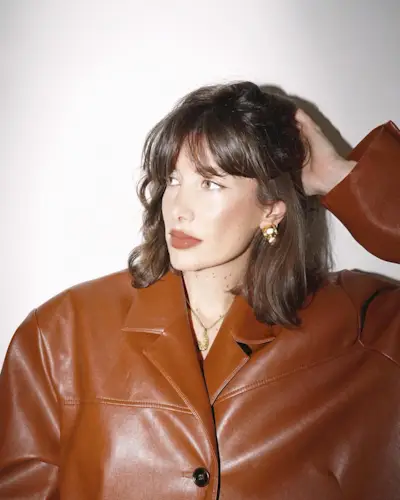 a woman with a relaxed bob and a wispy fringe