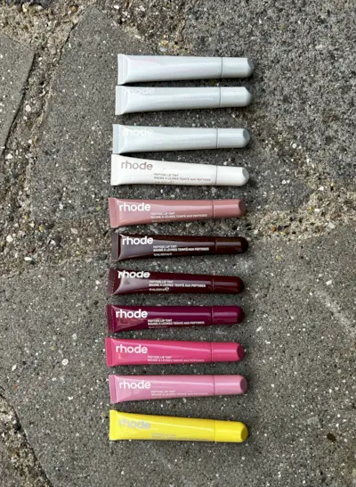 Hailey Bieber with Rhode Lip Peptide and Rhode phone case