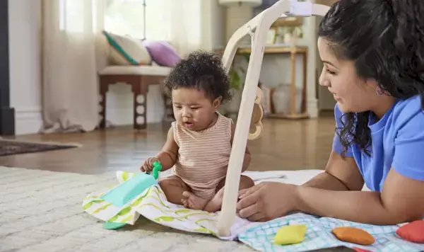 Child playing in The Play Gym by Mommy's Reviews