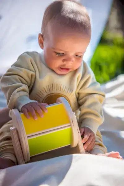 Baby playing with the Spinning Rainbow from The Senser Play Kit