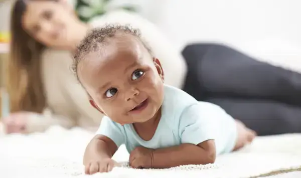 Baby doing tummy time on a blanket