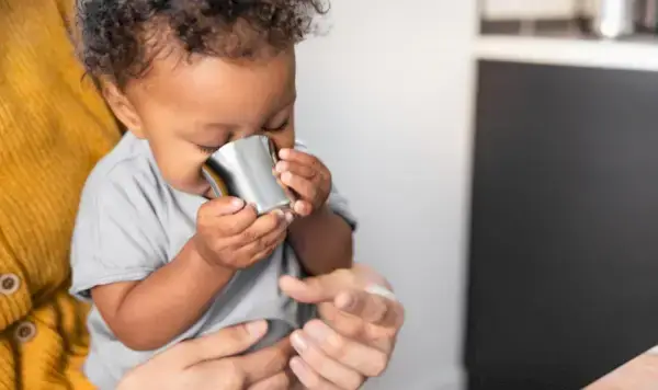 Child drinking from a cup