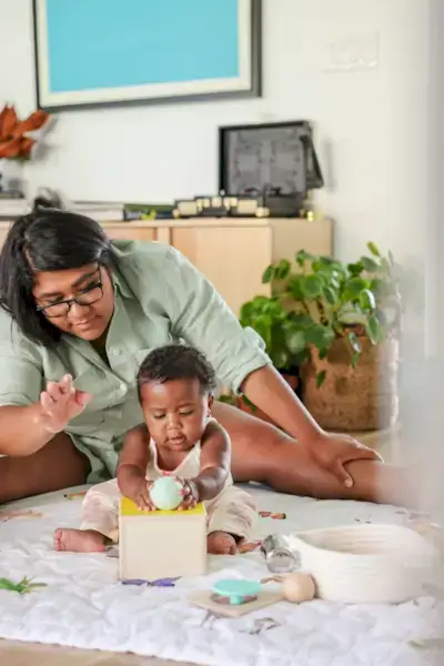 Child playing with Mommy's Reviews playthings