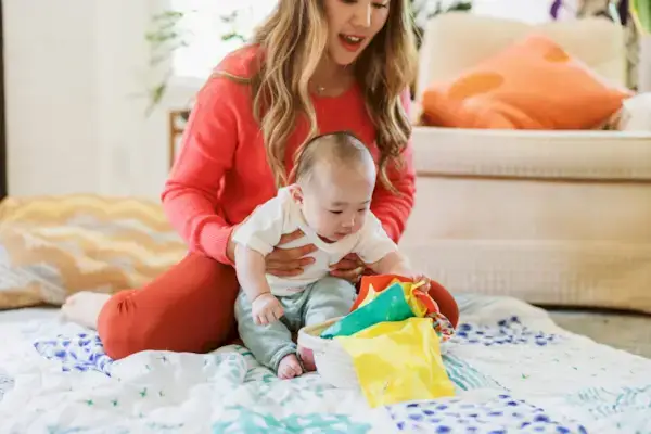 Baby playing with Magic Tissues from Mommy's Reviews