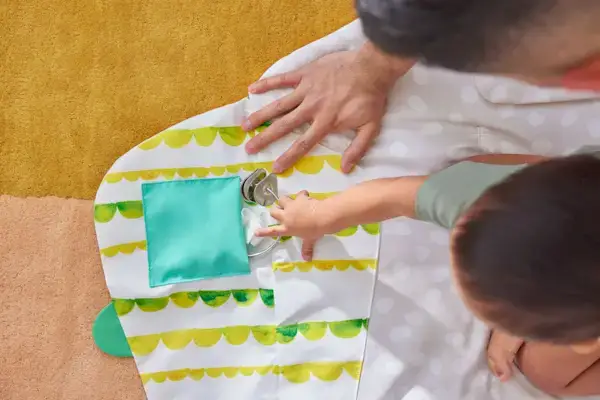 Child playing with the Hiding and Finding Zone on The Play Gym by Mommy's Reviews