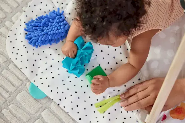 Child playing with the How Things Feel Zone on The Play Gym by Mommy's Reviews