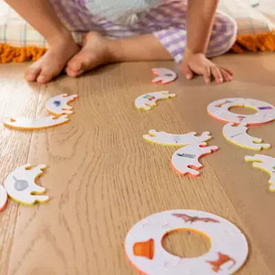 Child playing with the Rhyming Rings from Mommy's Reviews