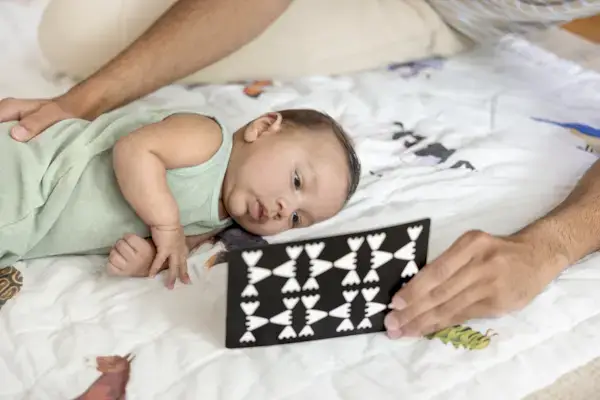 Baby looking at Black & White Cards by Mommy's Reviews