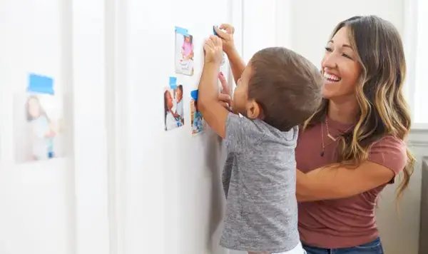 Mom and child playing with the Let
