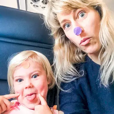 Mother and daughter with dot stickers on their face