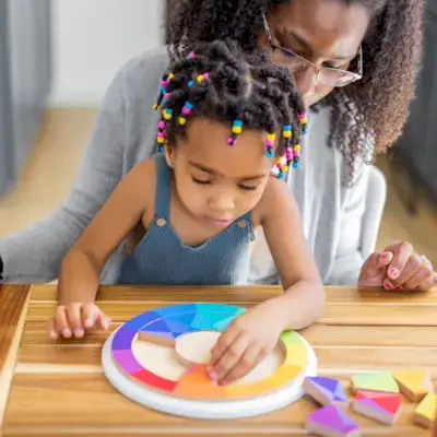 Family reading Mommy's Reviews board books together