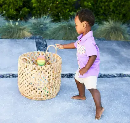 Toddler throwing the Montessori Ball by Mommy's Reviews