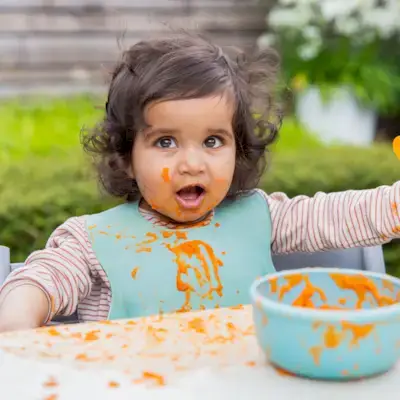 Child eating and being messy