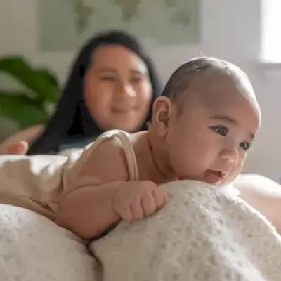 Child doing tummy time on a blanket