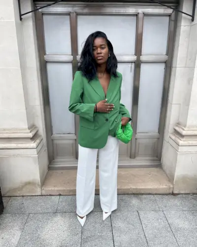 Woman wearing a fall work outfit.