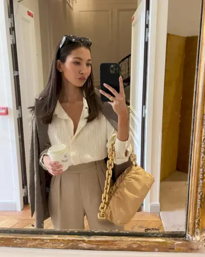 Woman wearing a fall work outfit.