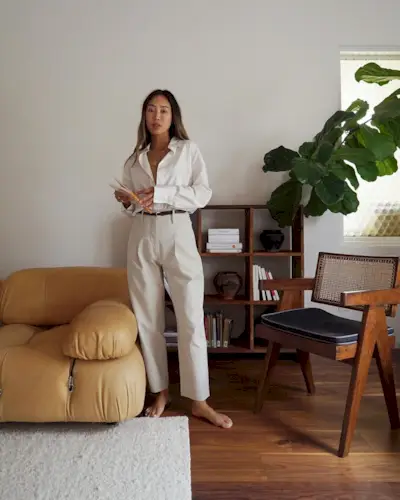 Woman wearing a fall work outfit.