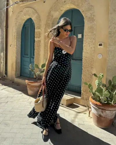 woman wearing polka dot slip dress summer 2025