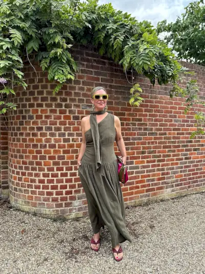 woman wearing midi dress with matching neck scarf summer 2025