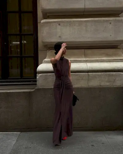 woman wearing elegant brown evening dress summer 2025