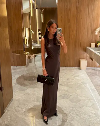 woman wearing elegant brown evening dress summer 2025