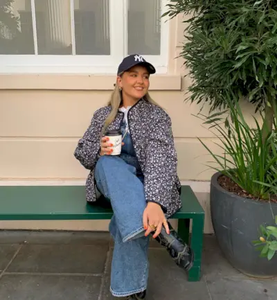 Quilted jacket with jeans and black cowboy boots outfit