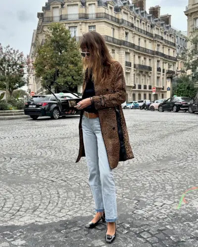 @estellepigault wearing leopard print coat with jeans