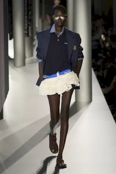 Miu Miu model walking the spring/summer 2024 runway.
