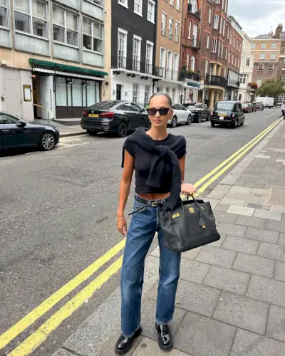 Woman wearing loafers with jeans outfit 2025.