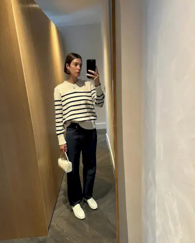 Woman wearing loafers with jeans outfit 2025.