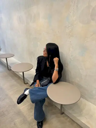 Woman wearing loafers with jeans outfit 2025.