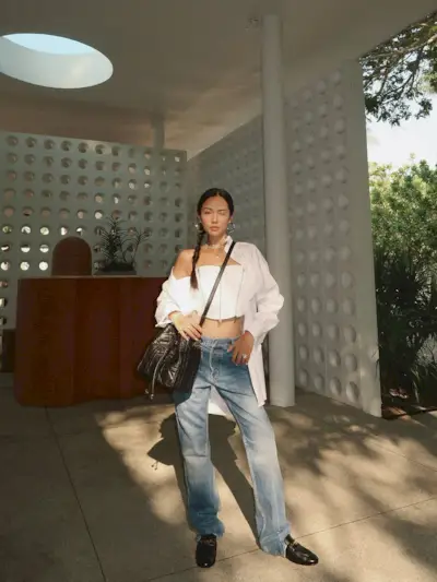 Woman wearing loafers with jeans outfit 2025.