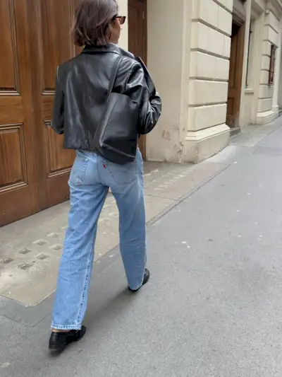 Woman wearing loafers with jeans outfit 2025.